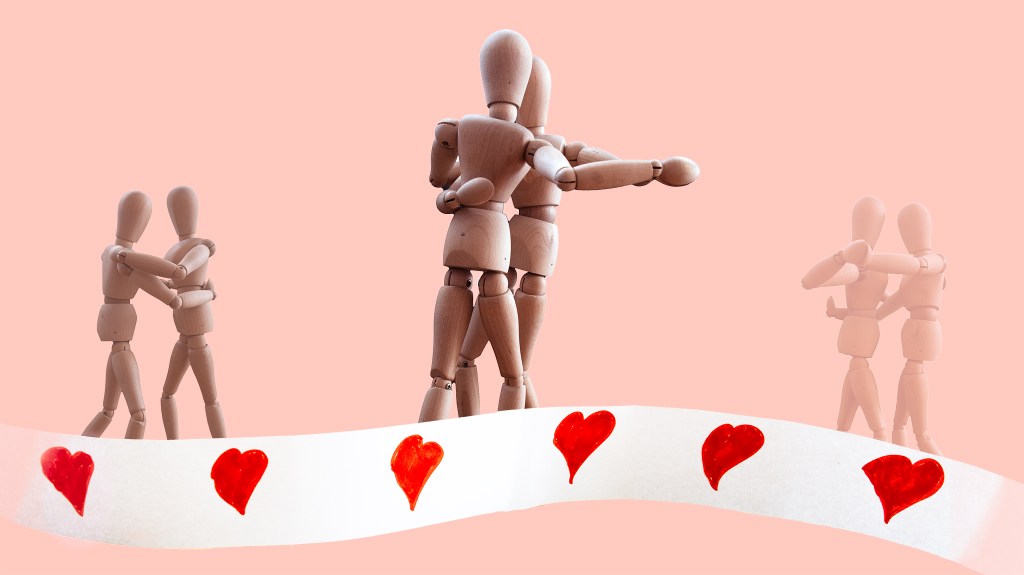 A couple of wooden manikins dancing. They are shown three times in the image (past, present, future; past and future are smaller and fainter); a banner of hearts at the bottom of the image symbolizes the passing of time.