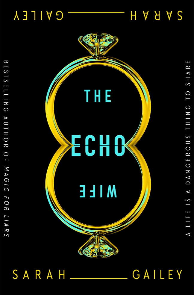 Book cover for The Echo Wife. It represents a mirrored diamond ring; the title is written in the middle as if it were split by the mirror too; the name of the author (Sarah Gailey) is mirrored on top and bottom of the cover.
