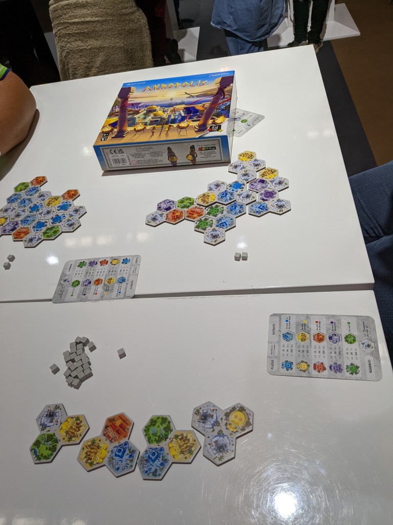 Akropolis - tri-hex colored tiles that can be stacked.