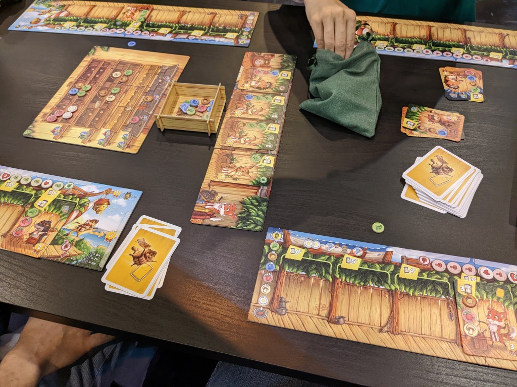 Treehouse diner - a track with time markings and customers, and an ingredient board getting refilled.