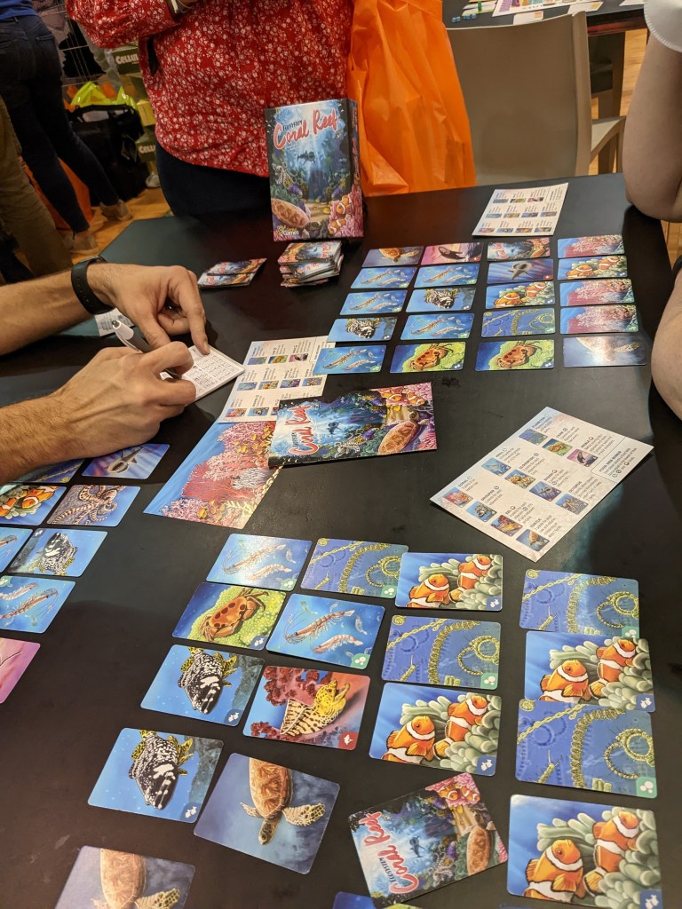 Ecosystem:Coral Reef: tableau of cards representing marine creatures.