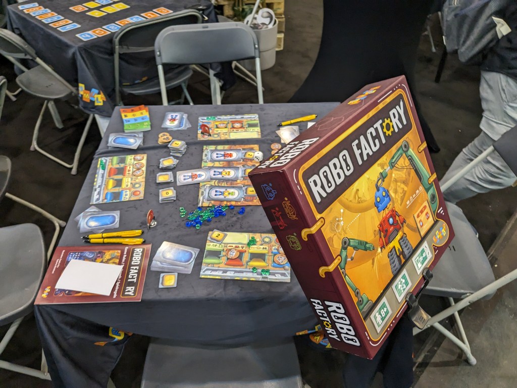 Robo Factory - colorful tiles with robots, and player boards with factories