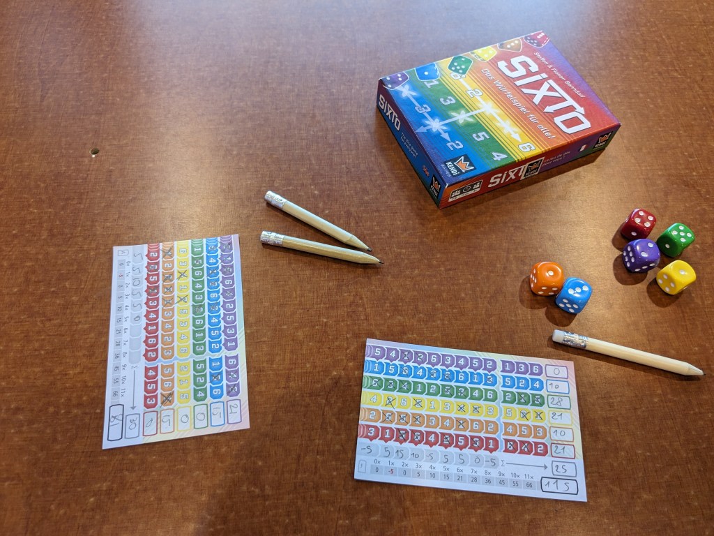 Sixto: 6-sided dice in 6 colors, and a marking sheet with numbers in striped lines.
