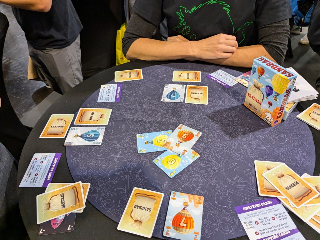 Sandbag: colorful cards with ballons; flipped down cards with sandbags on the back