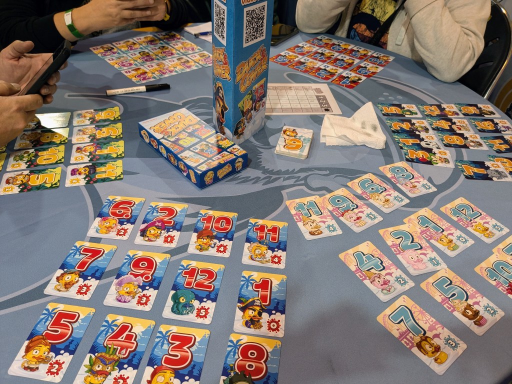 Duck & Cover: 3×4 tableaus of numbered cards with duck illustrations